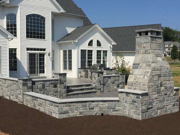 Custom Stone Patio with Built in Fireplace in Cheshire, CT